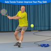 Man practicing tennis with a Solo Tennis Trainer on a court.