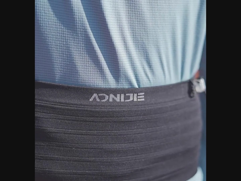 A black AONIJIE waist bag with zipper pockets.