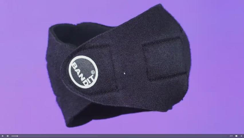 Black wrist support with a visible brand logo on a white background